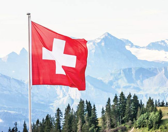 Swiss flag with mountains