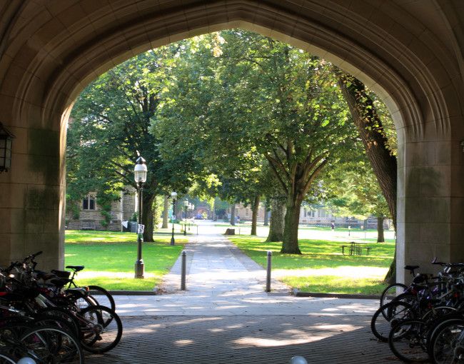 Archway on college campus with bikes