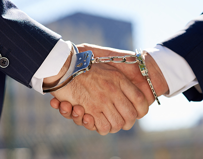 Handshake in handcuffs